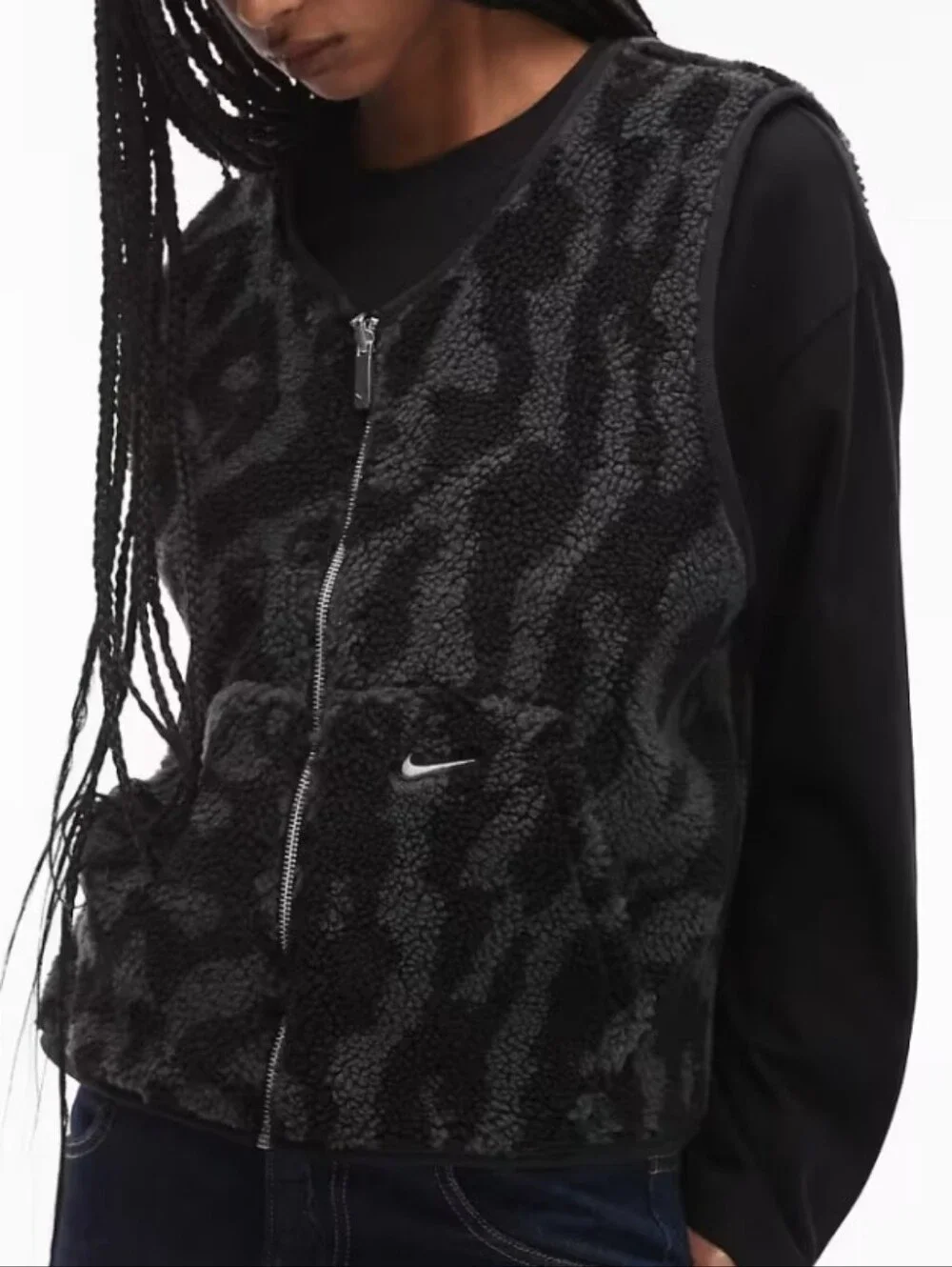 Nike Street reversible sherpa vest in black and leopard print